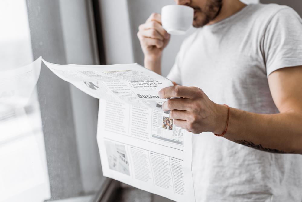 Reading Of Newspaper